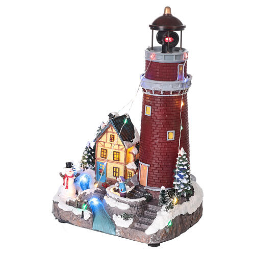 Christmas village with snow, church and animated Christmas tree, LED lights, 35x25x30 cm 9