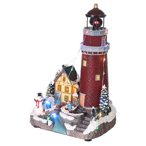 Villaggio natalizio neve chiesa albero Natale movimento luci led 35x25x30 9