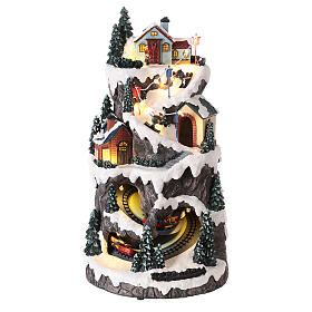 Village montagne neige train en mouvement lumières LED 40x20x20 cm