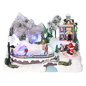 Villaggio Natale personaggi movimento luci led 20x30x20 cm 