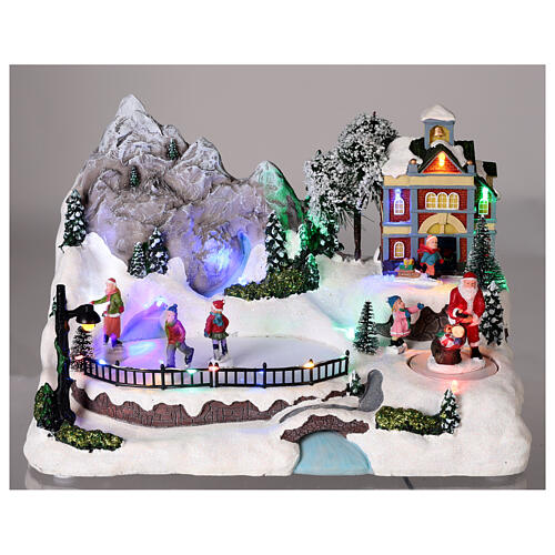 Christmas village with moving characters and LED lights 20x30x20 cm 2
