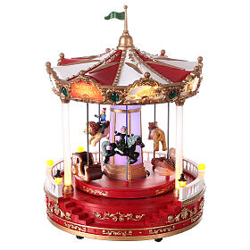 Carrousel Noël mouvement lumières LED 30x20x20 cm