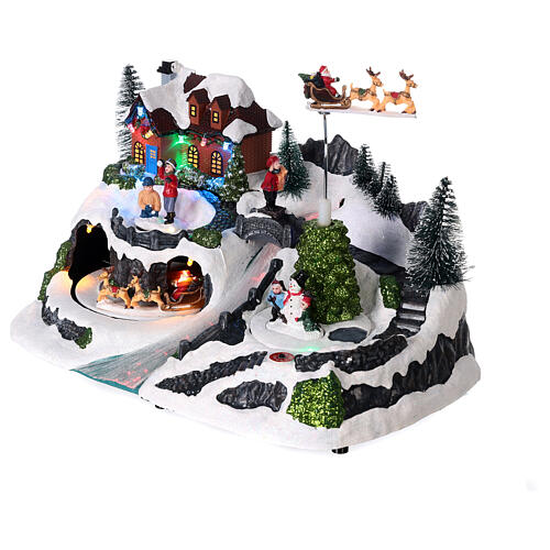 Escena navideña nieve trineo Papá Noel movimiento luces led 20x30x15 cm 3