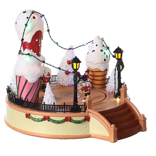 Giostra gelato pattinatori movimento luci led 20x25x25 cm 4