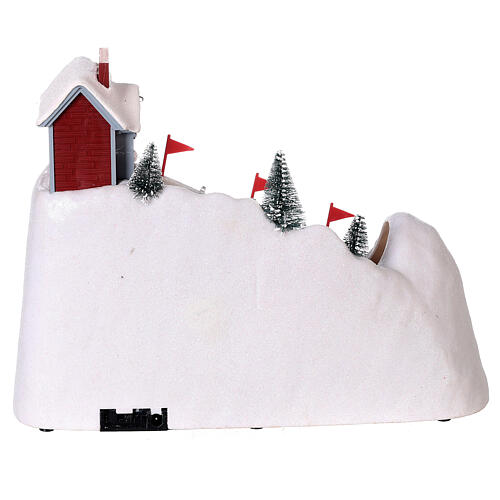 Christmas snowy village, mountain with skiers in motion, LED lights, 20x30x15 cm 5