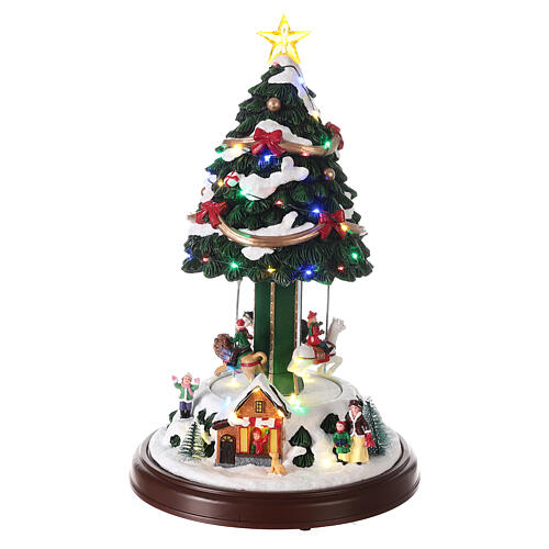 Carrousel sapin Noël neige chevaux mouvement lumières LED 40x25x25 cm 1