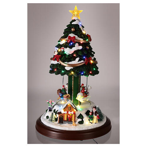 Carrousel sapin Noël neige chevaux mouvement lumières LED 40x25x25 cm 2