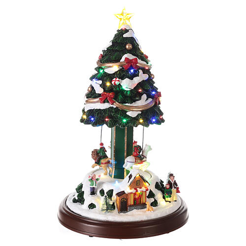 Carrousel sapin Noël neige chevaux mouvement lumières LED 40x25x25 cm 4