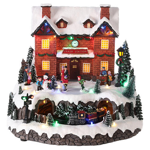 Christmas village set with snow and train in motion, LED lights, 30x30x25 cm 1
