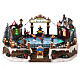 Christmas set with ice rink and skaters in motion, LED lights, 20x30x25 cm s1