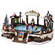 Christmas set with ice rink and skaters in motion, LED lights, 20x30x25 cm s3