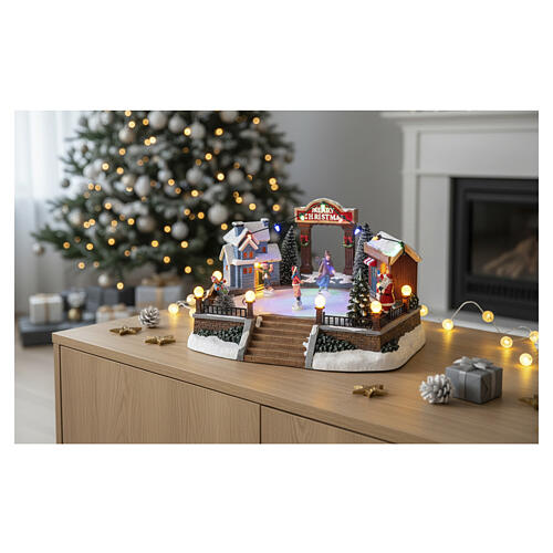 Décor Noël piste de patinage mouvement lumières LED 20x20x15 cm 2