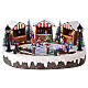 Christmas village with ice rink and figurines in motion, LED lights, 15x35x25 cm s1