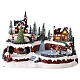 Christmas village set with snow and skaters in motion, LED lights, 25x40x25 cm s1
