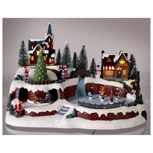 Scena Natale neve pattinatori movimento luci led 25x40x25 cm  2