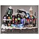 Snowy Christmas village with skiers and skaters in motion, LED lights, 25x30x20 cm s2