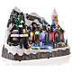 Snowy Christmas village with skiers and skaters in motion, LED lights, 25x30x20 cm s4