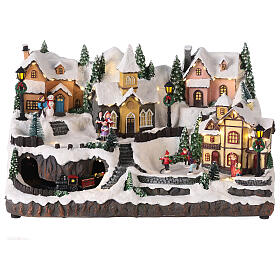 Villaggio Natale neve treno pattinatori movimento luci led 25x40x25 cm