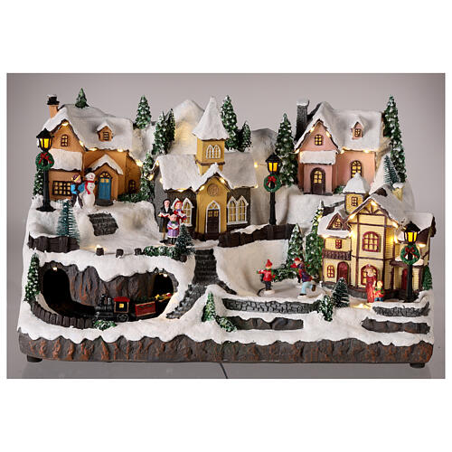 Villaggio Natale neve treno pattinatori movimento luci led 25x40x25 cm 2