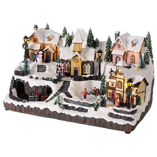 Villaggio Natale neve treno pattinatori movimento luci led 25x40x25 cm 3