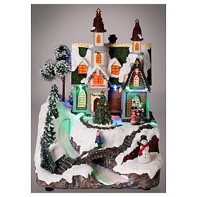 Christmas village with snow, church and Christmas tree, LED lights, 30x20x20 cm