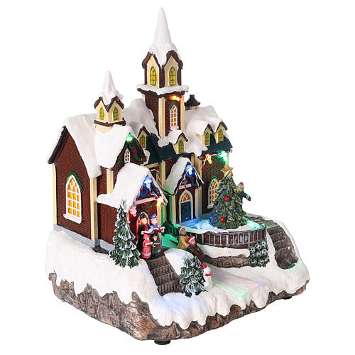 Cenário de Natal em miniatura igreja com árvore de Natal movimento luzes LED 30x21x20 cm 4