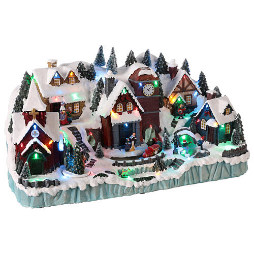 Christmas village with train in motion in a tunnel, LED lights, 30x50x30 cm 4