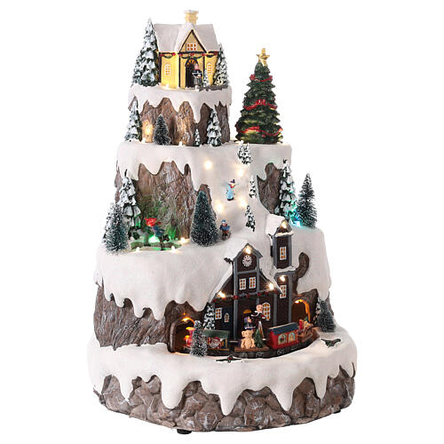 Aldeia de Natal em miniatura na montanha comboio movimento luzes LED 42x31x31 cm 4