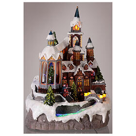 Christmas village set, church with Christmas tree, motion, lights and music, 25x25x35 cm, electricity/batteries