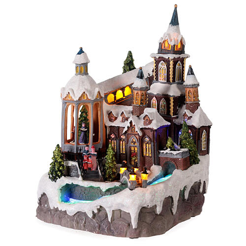 Christmas village set, church with Christmas tree, motion, lights and music, 25x25x35 cm, electricity/batteries 3