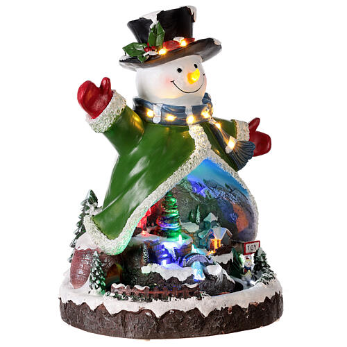 Muñeco de nieve movimiento música LED 2 funciones 40x29x28 cm corriente 4