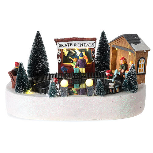 Christmas village set, ice rink, motion music and LED lights, 15x30x20 cm, battery-powered 1