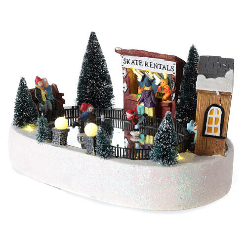 Villaggio pista pattinaggio movimento musica Led 15x30x20 cm batteria 3