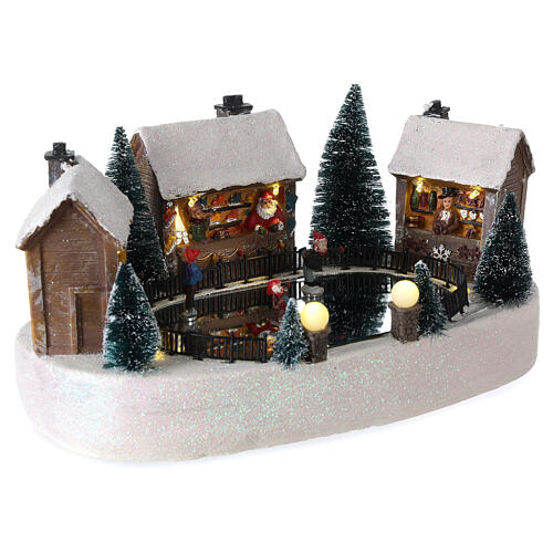 Christmas village set, ice rink with houses, motion music and LED lights, 15x30x20 cm, battery-powered 4