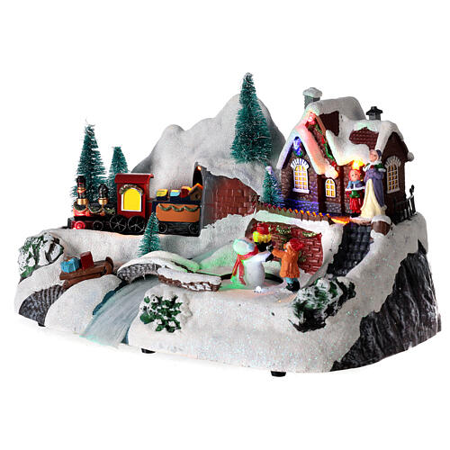 Aldeia natalina em miniatura comboio, rio, boneco de neve movimento, luzes, música 19x30x19 cm 3