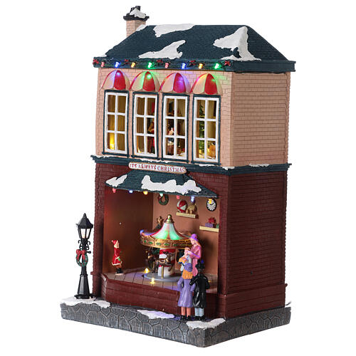 Weihnachtsdorf Haus mit Bewegung Musik und LEDs, 40x25x20 cm 3