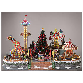 Décor de Noël fête foraine avec éclairage, sapin de Noël et manèges 60x90x60 cm