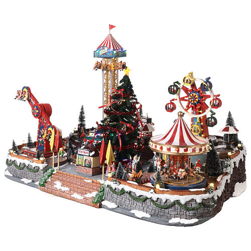 Christmas village amusement park with lights, Christmas tree, rides 60x90x60 cm 3