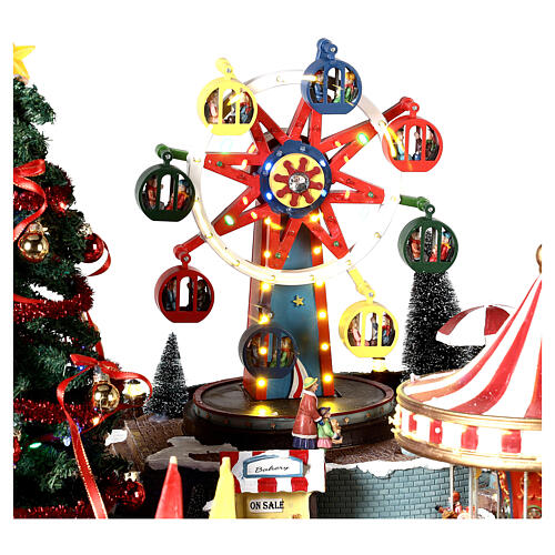 Christmas village amusement park with lights, Christmas tree, rides 60x90x60 cm 5