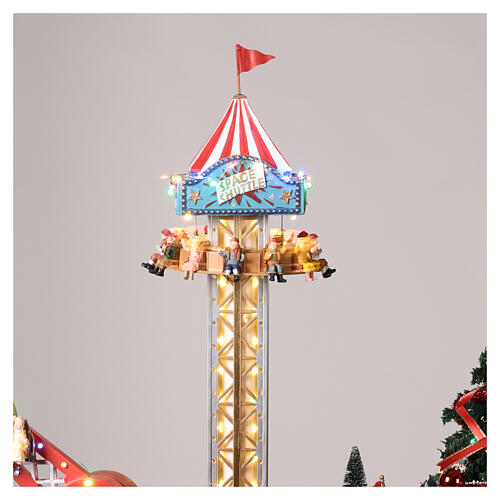 Christmas village amusement park with lights, Christmas tree, rides 60x90x60 cm 7
