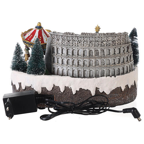 Christmas village: Colosseum with Christmas tree and merry-go-round, motion lights and music, 15x25x20 cm 5
