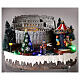 Christmas village with Colosseum, Christmas tree and moving merry-go-round, light and sound 15x25x20 cm s2
