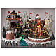 Christmas village: decorated merry-go-round, castle and sleigh ramp, motion lights and music, 25x35x25 cm s2