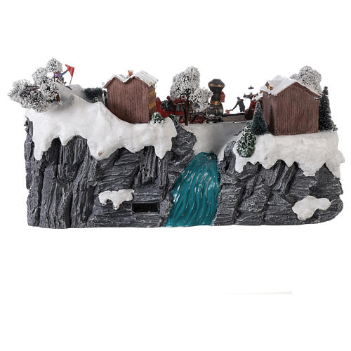 Village de Noël montagne avec piste de ski, train et patineurs mouvement lumières musique 30x60x50 cm 5