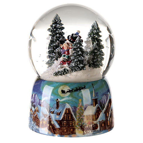Musical Christmas snow globe sled with children 15x10x10 3