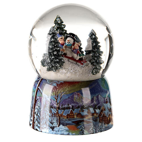 Musical Christmas snow globe sled with children 15x10x10 4