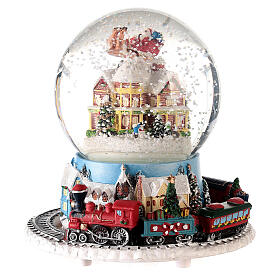 Christmas music box with Santa's sleigh on a house rooftop 15x15x15 cm