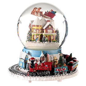 Caixa de música globo de neve comboio, casa e Pai Natal no trenó, 16x16x16 cm