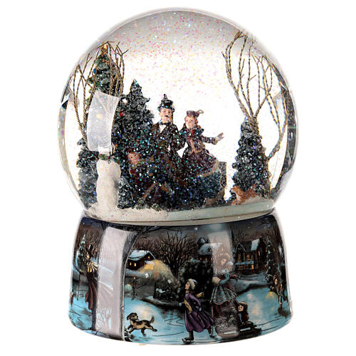 Christmas snow globe musical skaters 20x15x15 cm 2