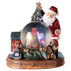 Christmas snow globe Santa and gifts battery powered 30x25x30 cm